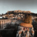 woman overlooking the acropolis in greece